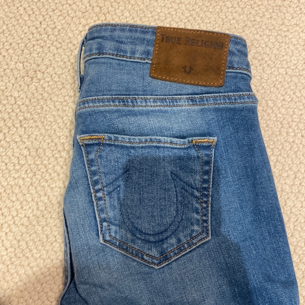True religion size 25 Sara cigarette